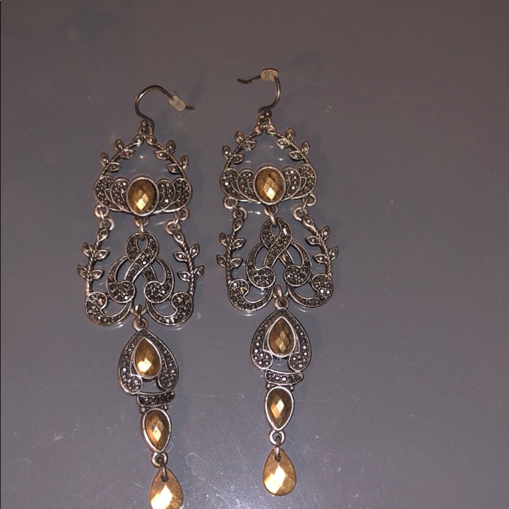 Gold and silver dangly earrings